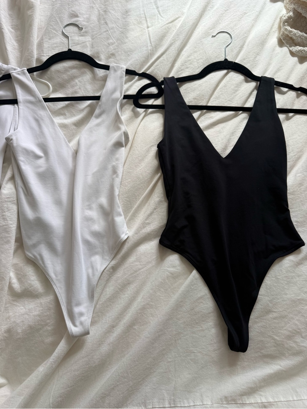 2 ARITZIA v neck bodysuits -black and white